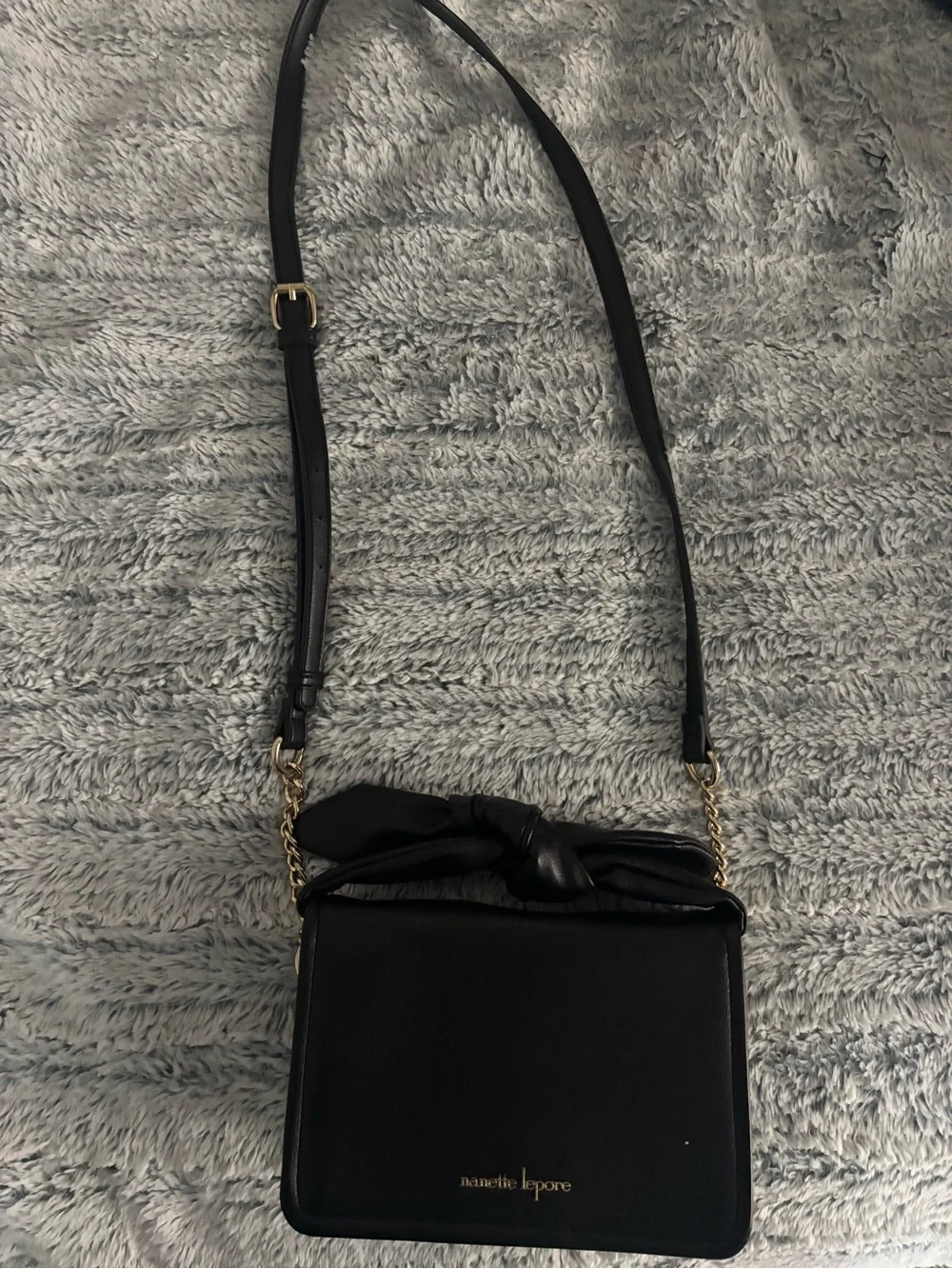 Nanette Lepore Black Crossbody with Gold Chain Accent and Knotted Top